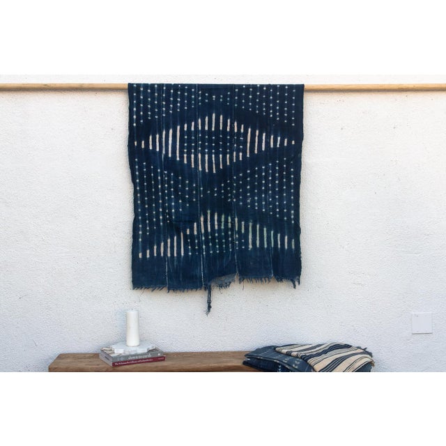 Hand-woven by master weavers of the Mossi and Dioula traditions in Burkina Faso, West Africa, these vintage textiles are...