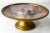 We are selling this great French Limoges enameled compote dish. This pedestal dish has painted basin with an interior...