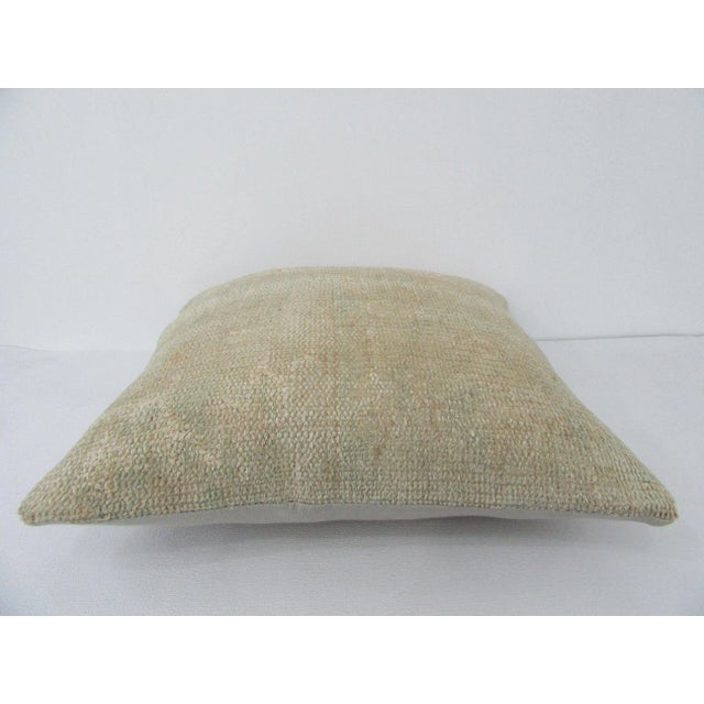 Decorative pillow cover made from an antique handknotted rug. Backed with good quality cotton fabric. Pillow inserts not...