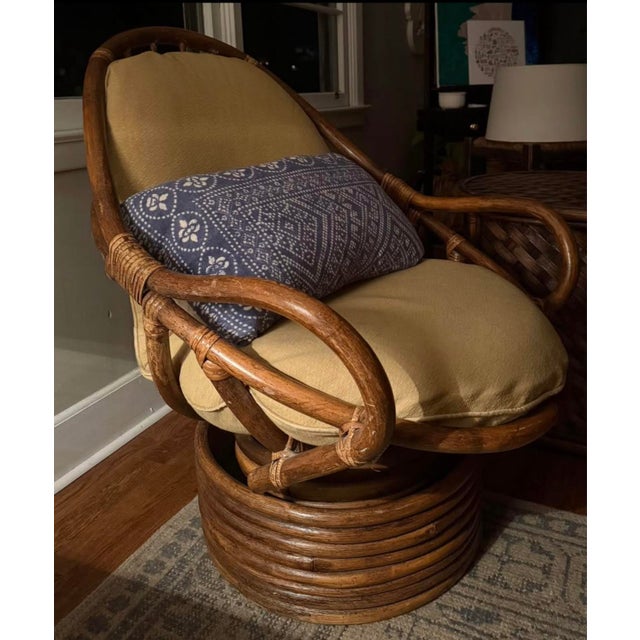 This vintage bamboo swivel rocker provides the perfect spot in any home. Cushions and chair are in perfect condition.