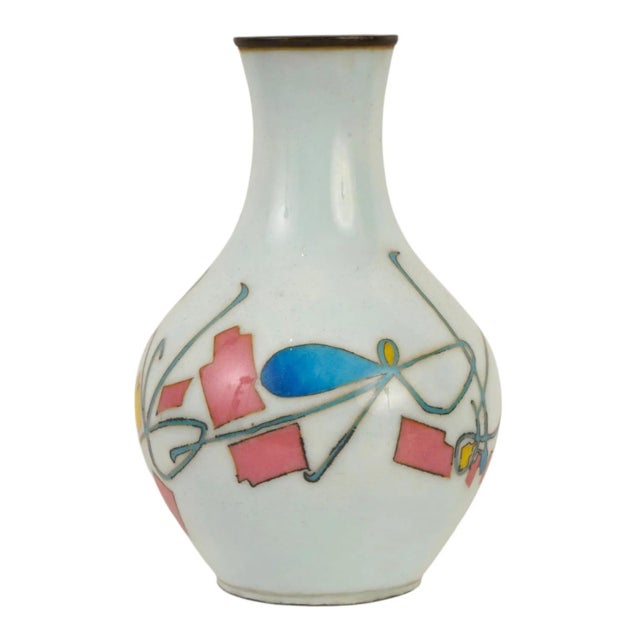 A vintage Japanese enameled copper vase. Showa era, mid-20th century. Bottle-shaped piece worked in copper wire and...