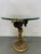 The side table has a wooden base with a glass top, dating from the 1960s and made in Italy. It's in lovely used condition...