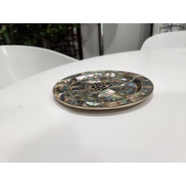 Los Castillo's style Mexican silver butter plate with a bird design. silver - metal with mother of pearl