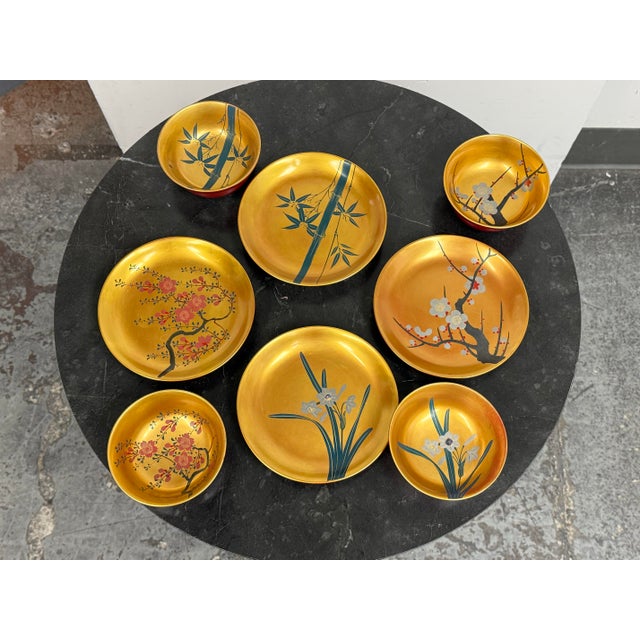 Design Plus Gallery presents a Set of Eight Japanese Botanical Bowls & Plates. The collection includes four bowls and four...