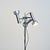 Multi-spot floor lamp made around 1970. The metal structure supports several adjustable brushed aluminum heads, allowing...