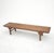 This antique Chinese elm bench showcases a blend of traditional craftsmanship with its classic inset flush top and...