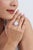 This handcrafted cocktail ring features a 9.01-carat Ethiopian opal centerpiece and 18K white gold. The center stone...