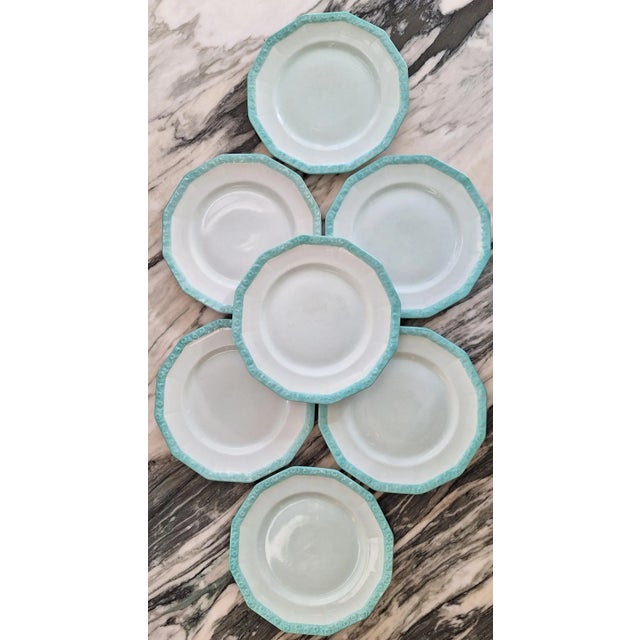 Art Deco meets Art Nouveau in these transitional style 12-sided salad plates. An all-over seafoam color plate is accented...
