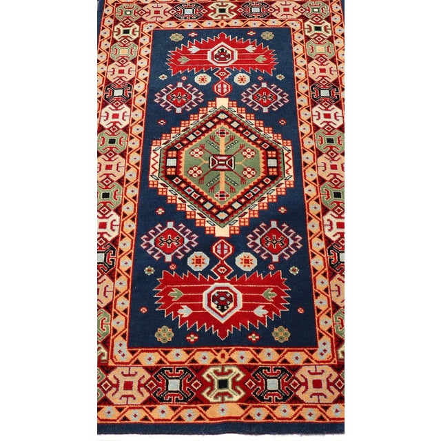 Tribal geometric medallion design vintage rug from Caucasus in multi-colors, Keivan Woven Arts / rug 10-KE-311, country of...