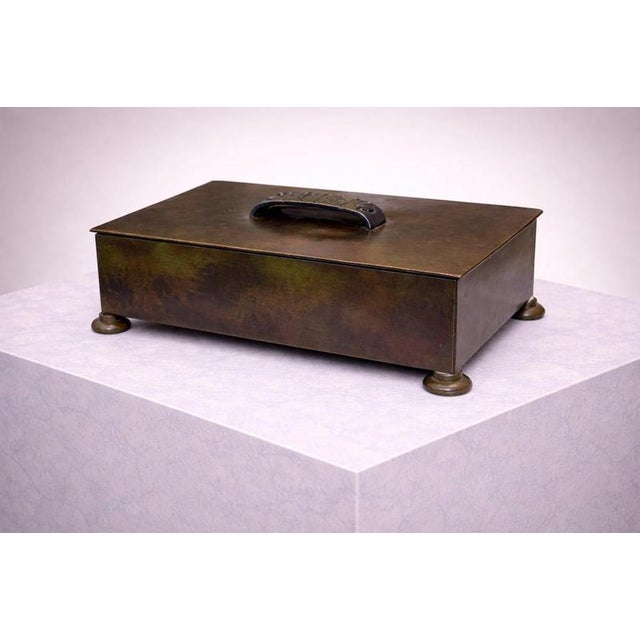 An elegant Swedish Grace bronze box, dating to circa 1930, embodying the refined restraint and timeless sophistication of...