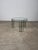 Pair of stacking side tables made of iron and glass — 1970s an elegant pair of stackable coffee tables made of iron and...