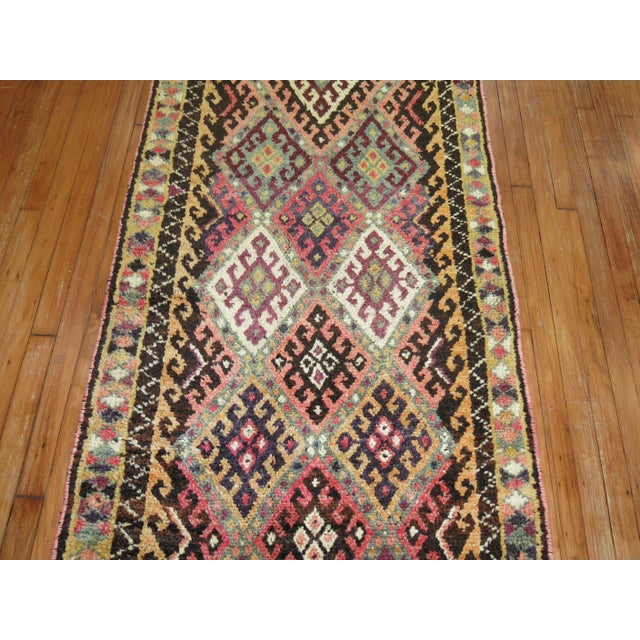 Tribal Turkish Geometric runner from the middle of the 20th century. Measures: 3'3'' x 15'
