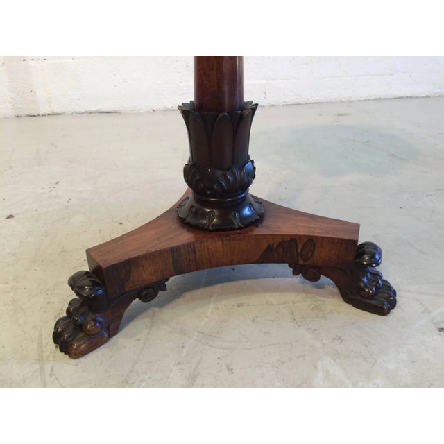 Beautiful antique three-legged side table with claw feet. Please check out all the details.