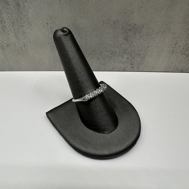 This elegant 7 Stone Diamond Ring in 14kt White Gold features 0.30 carat total weight (ctw) of natural GH color, VS/SI...