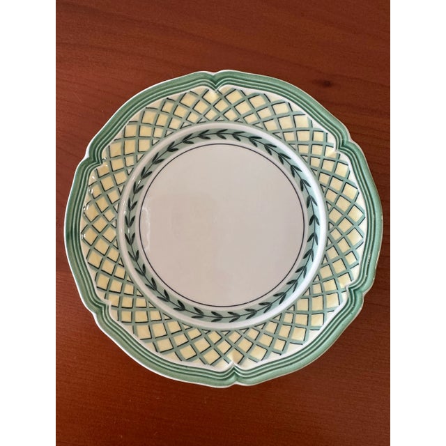 The Villeroy and Boch “French Garden Orange” 7 pieces bread and butter plates featured a Mid-Century Modern style with a...