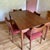 Vintage 1960s extendable dining table and four chairs, designed by Henning Kjaernulf for Vejle Stole og Møbelfabrik,...