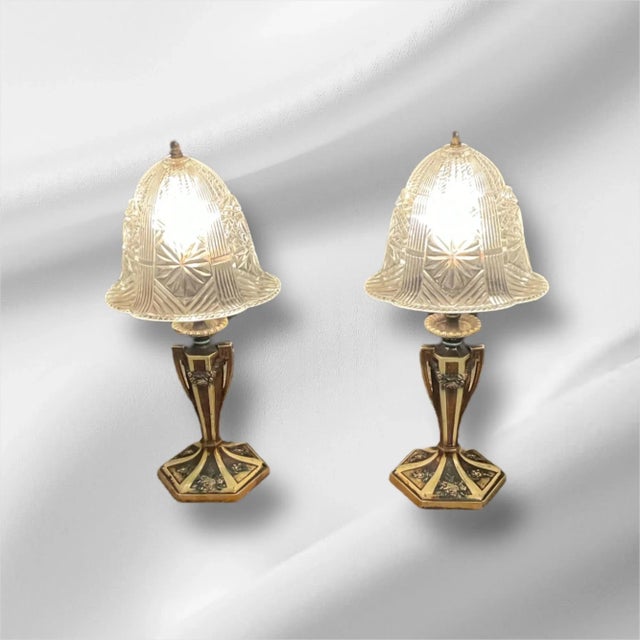 This set of Art Deco boudoir lamps is extraordinary. The intricate crystal lamp shades are clip ons, believed to be Muller...