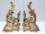 Stunning pair of 1950s solid brass French andirons, in vintage condition with minor wear and patina due to age and use.