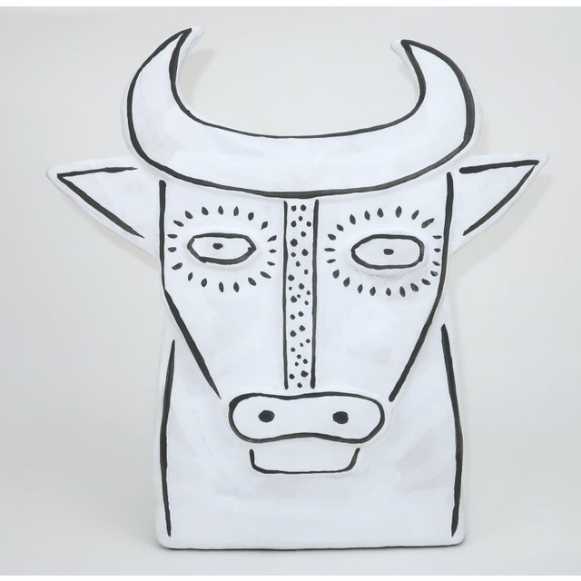 Inspired by Picasso's innovative ceramic designs, Xiang Yang created Thomas the Bull for Currey & Company...a chalky white...