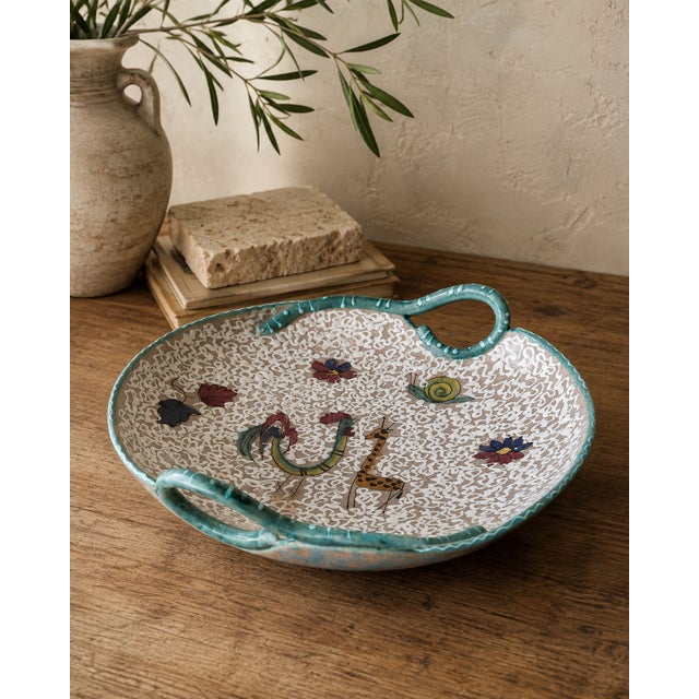 A wonderfully characterful mid-century italian art pottery bowl by ars artigiana of deruta, decorated with an expressive...