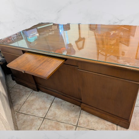 Walnut Executive desk built by the Jofco Furniture Company of Jasper Indiana in the 1950's. Desk is a solid construction,...