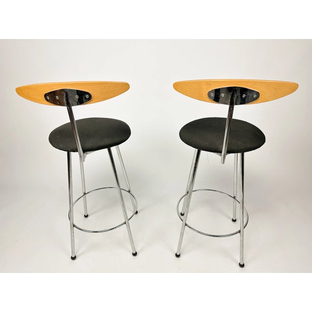 A matching pair of vintage Effezeta Italian design bar stools / chairs having shaped beech backrests with circular padded...
