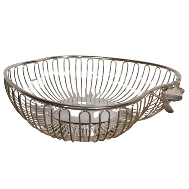 Silver plate fruit bowl having a wire work body, in the form of a halved apple. Charming design, clean, ready to use...