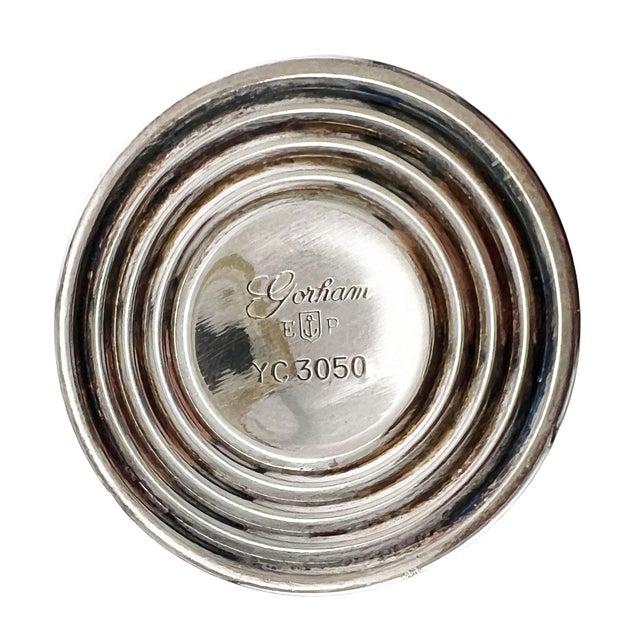 A refined Gorham silverplate bud vase, crafted with the elegance and quality that made Gorham Silver Company one of...