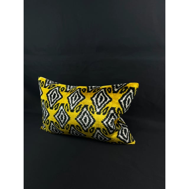 Introducing a stunning Turkish velvet ikat pillowcase, expertly handwoven from the finest silk and adorned with vibrant...