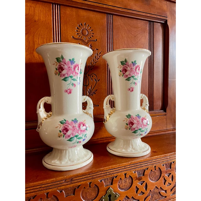 Pair of vintage 1940s double-handled Medici-style vases decorated with a hand-painted rose motif and dainty gold...