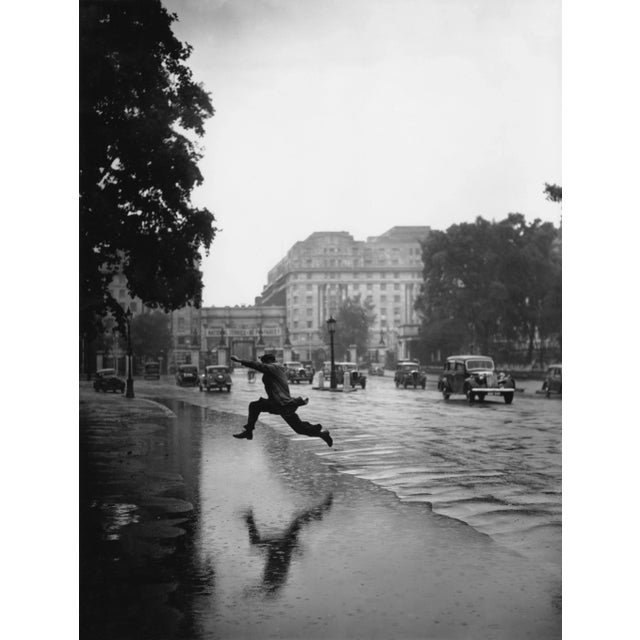 Flooded Road (1939) - Silver Gelatin Fibre Print (Photo by Alfred Hind Robinson/Getty Images Archive) A pedestrian...