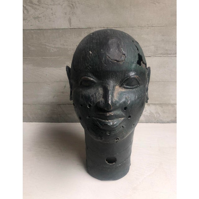 Artist unknown Africa H 42cm W 28cm An expressive cast bronze head inspired by the traditional royal portrait sculptures...
