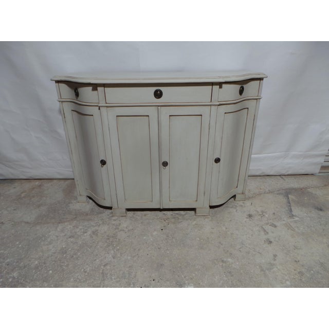 This is a Unique 4 Door 3 drawer Gustavian style Sideboard. it was restored and repainted with Milk Paints "Oyster White"