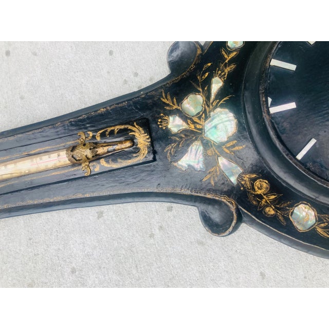 Collection worthy barameter, this antique is Victorian paper mache with pearl inlay. A rare find!