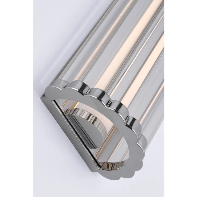 Kean 21" Sconce in Polished Nickel with Clear Glass Rods Designer: Chapman & Myers Height: 21" Extension: 3.75" Backplate:...