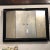 Wonderful wall mounted TV display unit with 2 hinged doors in an ebony and distressed silver finish.