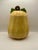 A vintage textured tall squash lidded cookie jar with two leaves and stem.