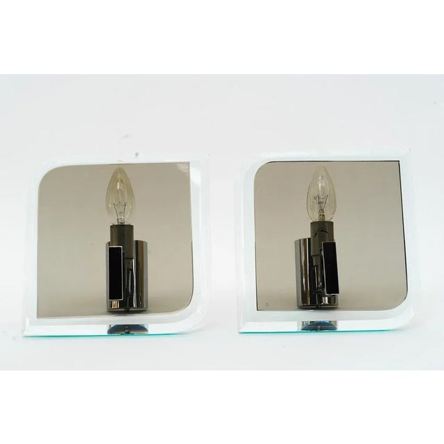 2 Nickel - glass wall lamps Italy around 1970s. Good original condition. European Plug (up to 250V).The wiring of this...