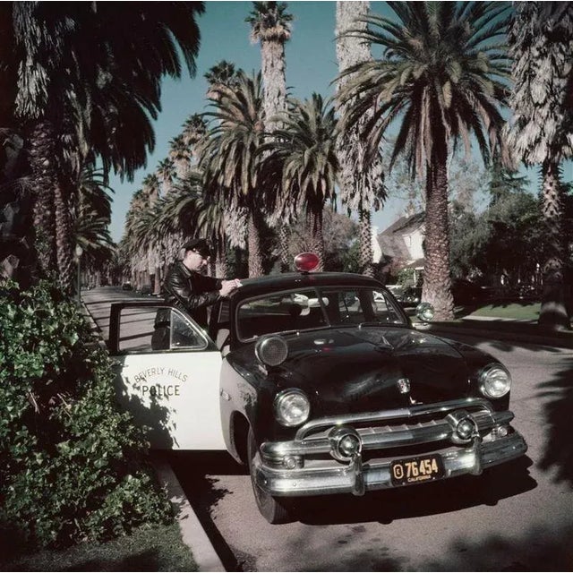 Police Patrolman (1960) Limited Estate Stamped (Photo By Slim Aarons) Beverly Hills police patrolman Lee R. Hathaway...
