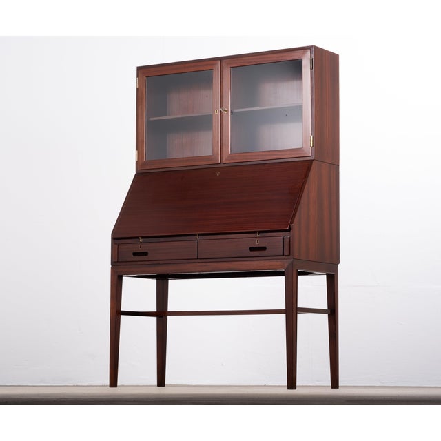 Beautiful danish mahogany secretary and display cabinet designed by kai winding and manufactured by p. Jeppesen in the...
