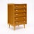 Chiffonier from the mid-century modern period in France. This piece is made of solid wood construction, primarily cherry...