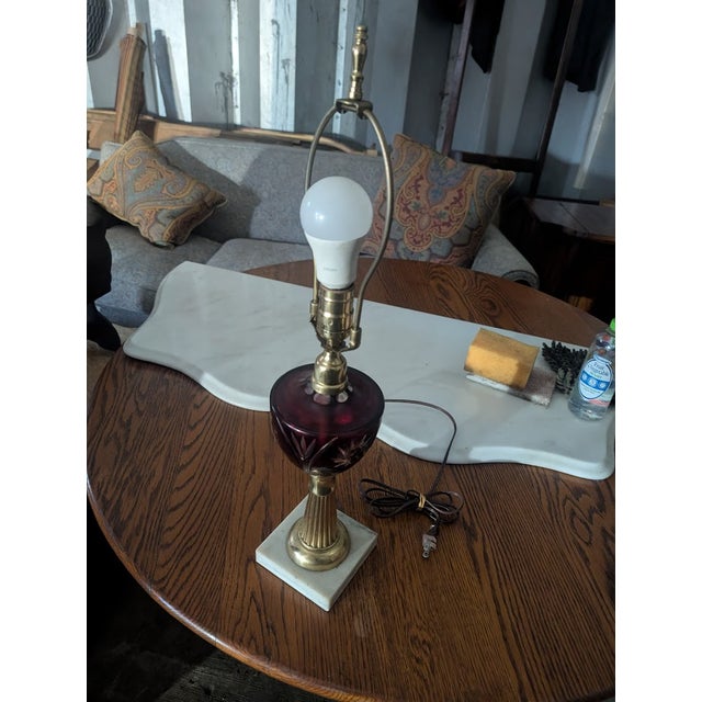 This striking vintage table lamp is a true statement piece that blends Victorian-era glamour with practical modern...