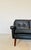Made in Denmark by Svend Skipper, a beautiful classic Danish 3-person sofa upholstered in soft buttoned black leather,...