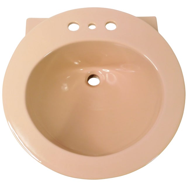 This sink is in very good overall condition, save for a couple tiny dings and a few faint scratches. The only spots found...