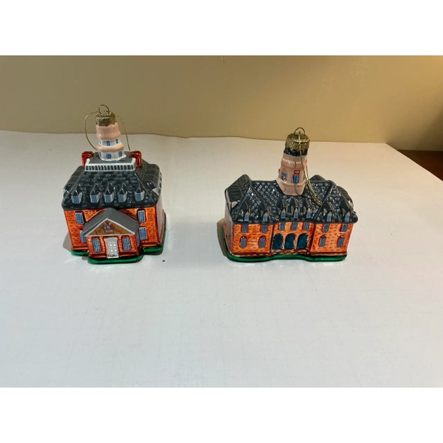These blown glass Christmas Tree ornaments are highly detailed replicas of historic buildings in Colonial Williamsburg....