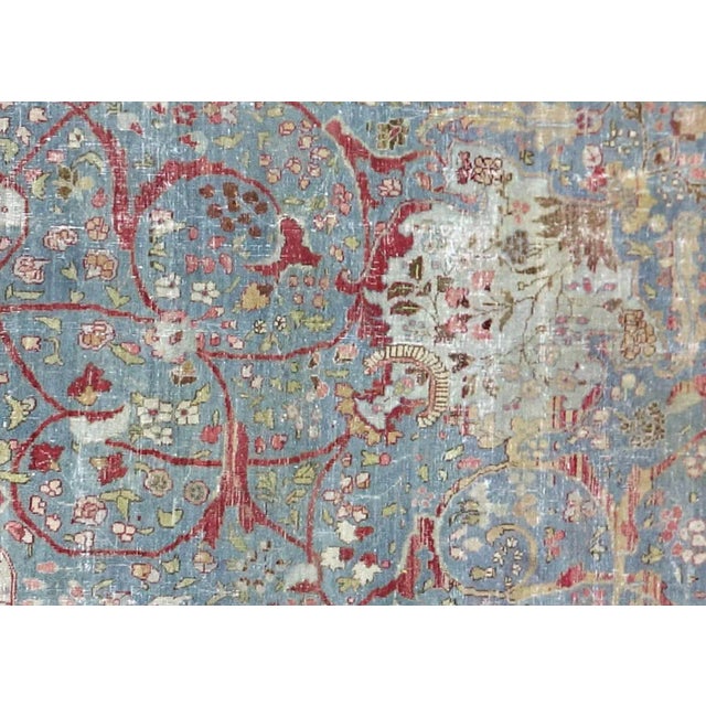 This Semi Antique Persian Tabriz Rug measures 10'1" x 14' and is hand woven in Northern Iran, specifically the Tabriz...