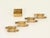 Stunning and super stylish Mid-Century set of four stackable ashtrays with matching holder, entirely crafted in solid...