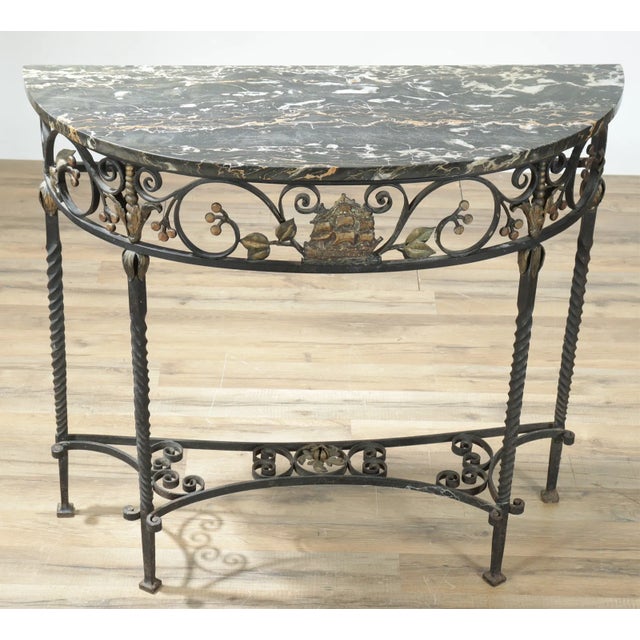 Nice old iron and marble demilune console with ship theme metal work. Top is removable.