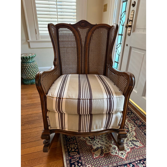 Antique Cane Rocking Chair in beautiful condition! Newly recovered in a performance fabric but easily recoverable to your...