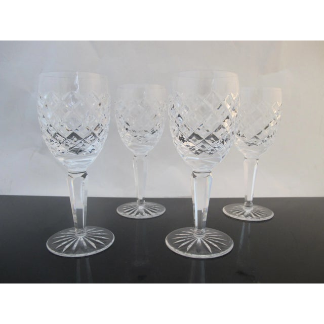 Set of 4 Waterford crystal claret wine glasses each measuring 6.75" tall x 2.5" wide at mouth. I believe they are Comeragh...